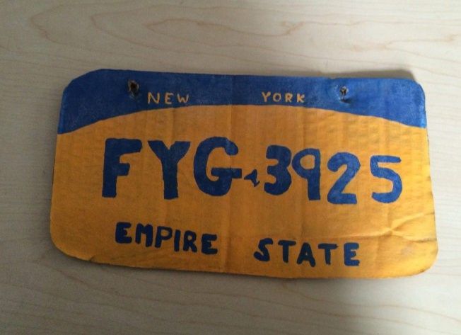 Homemade, cardboard license plate lands NY woman in jail