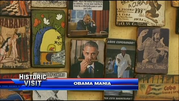 Cuba to lift penalty on dollar but warns Obama not to meddle