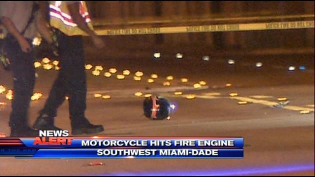 Motorcycle crashes into fire truck