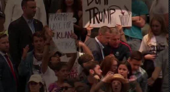 Prosecutor won't pursue battery charge against Trump aide