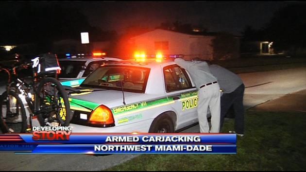 Uber driver carjacked at gunpoint, suspect at large