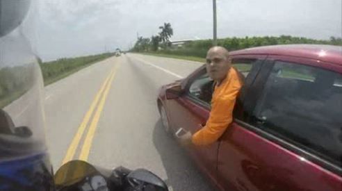 Motorcyclist nearly driven off road in road rage altercation