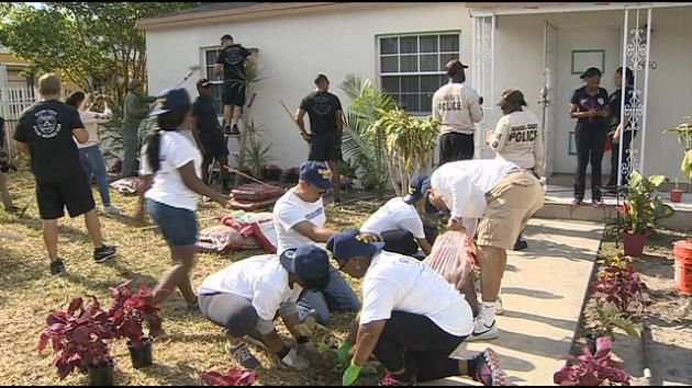 Police Officers, Wal-Mart associates fix up elderly woman's house