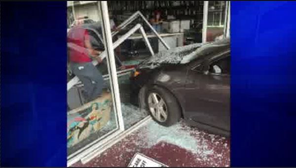 Car crashes into smoke shop