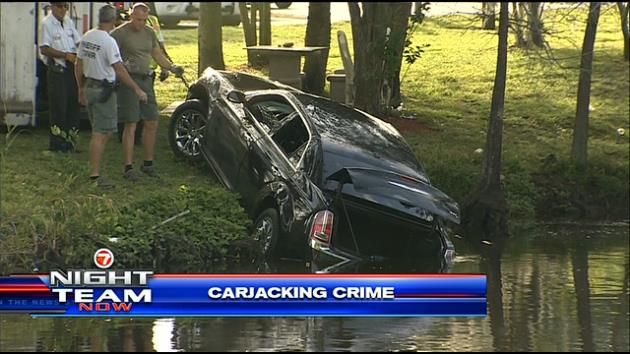 Car involved in carjacking pulled from canal; owner recovering