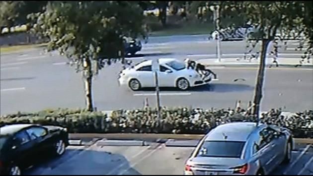 Road rage ends with man clinging to car in Kendall