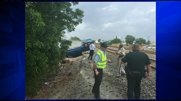 Tri-rail, truck collision causes traffic delays