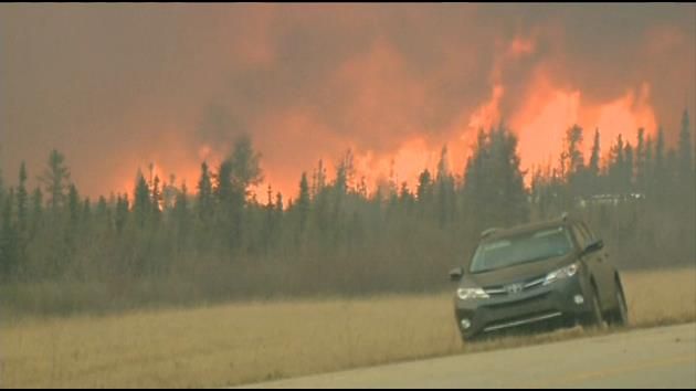 Alberta premier tours fire-ravaged Fort McMurray
