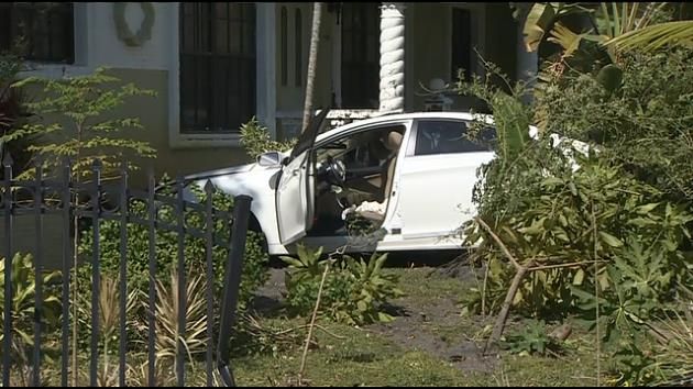 Stolen car slams into home during police chase, 4 arrested