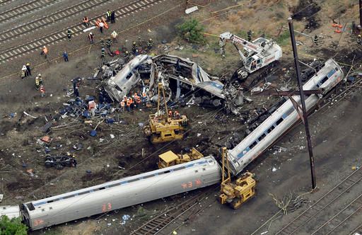 Feds: Amtrak engineer went 'from distraction to disaster'