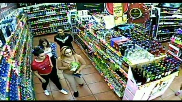 Police search for persons of interest in fatal liquor store shooting