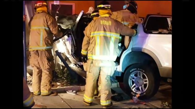 Vehicle crashes, bursts into flames trapping driver