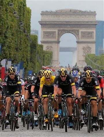 Paris police open fire on car at Tour de France barricades