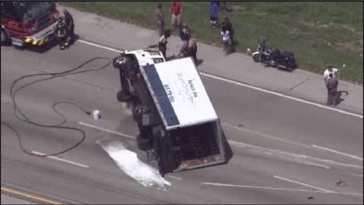 Two-vehicle crash on I-75 in Hialeah leaves truck on its side