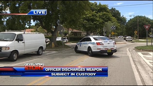 Barricaded subjects in custody, dog hurt after officer fires gun