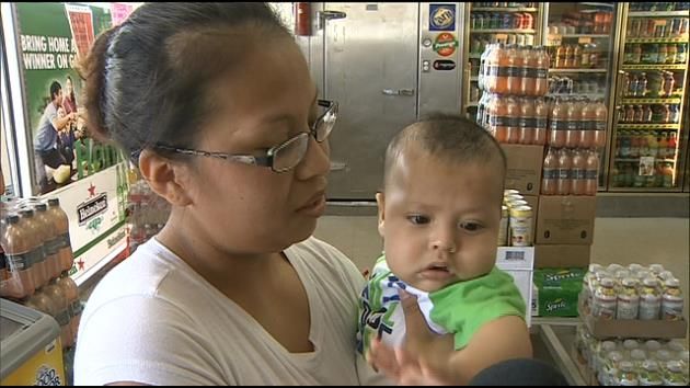 Baby moved to safety moments before car crashes into store, no injuries