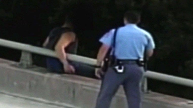 Cop's stunning move to suicidal man
