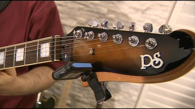Former officer creates unique guitars, becomes national hit