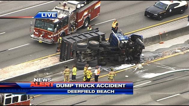 Dump truck overturns on Turnpike in Deerfield Beach; driver injured