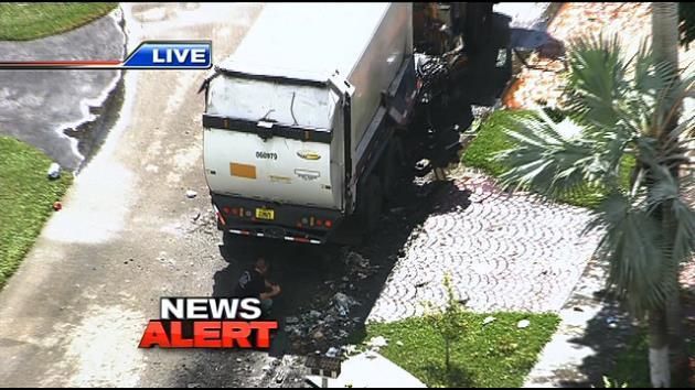 Small explosion ignites inside garbage truck