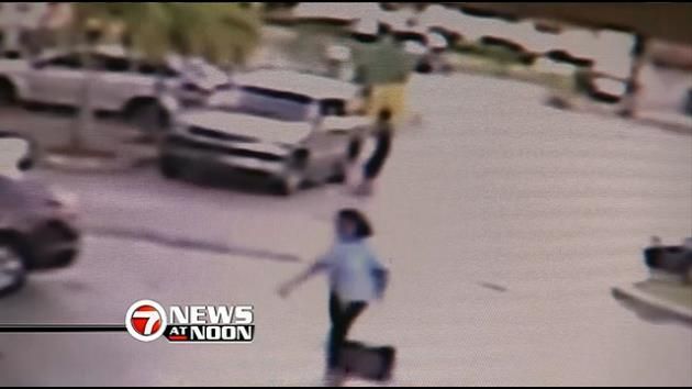 Surveillance captures thief stealing car with child inside