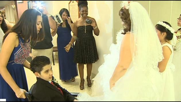 Teen battling cystic fibrosis walks mom down aisle