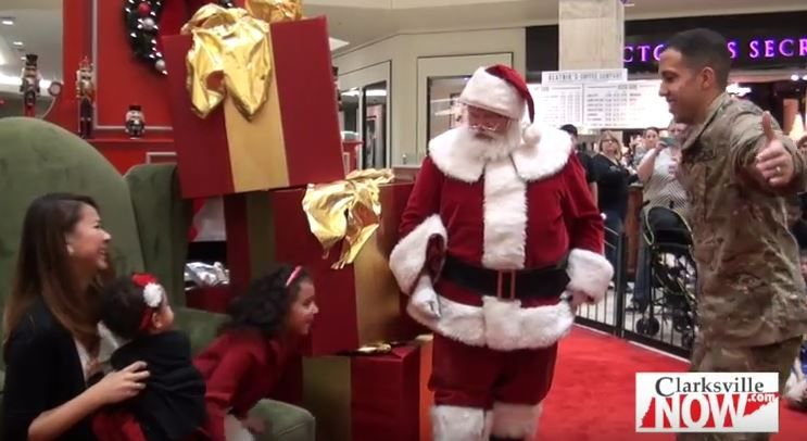 Fort Campbell Soldier surprises daughters while she is with Santa