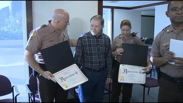 Miami-Dade officers receive honor for saving bailiff