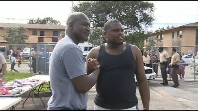 Evander Holyfield holds gift giveaway for Liberty City children