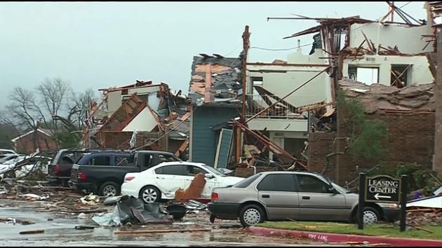 Large storm brings twisters, floods, now snow and ice