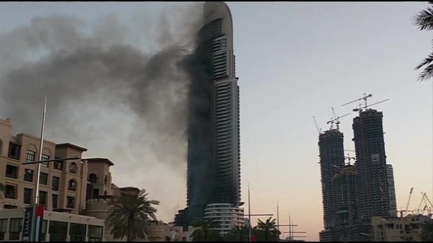 New Year's Eve skyscraper fire in Dubai smolders into 2016