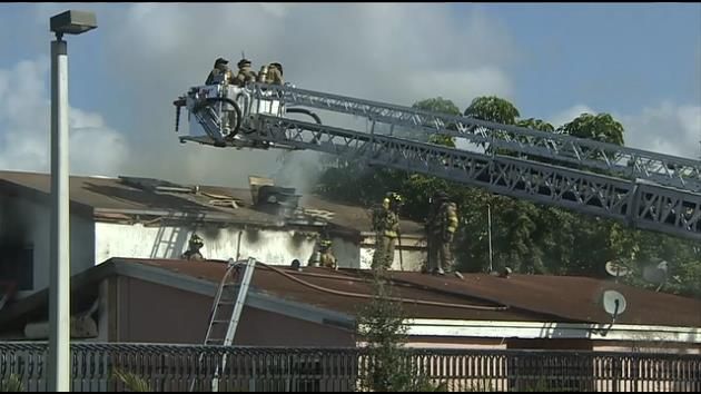 Woman arrested, 6 displaced after 'suspicious' apartment fire