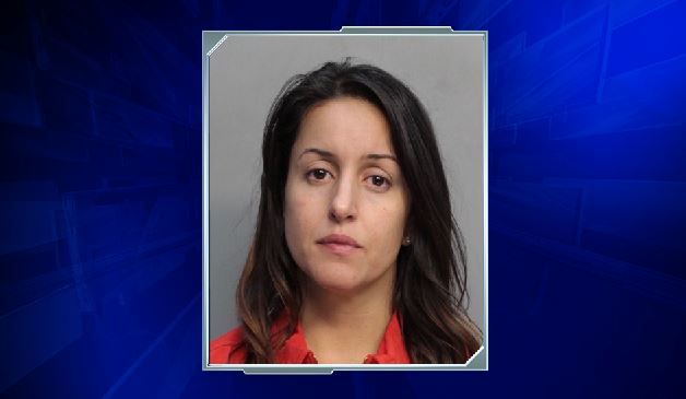 Mother arrested after child found in burning apartment