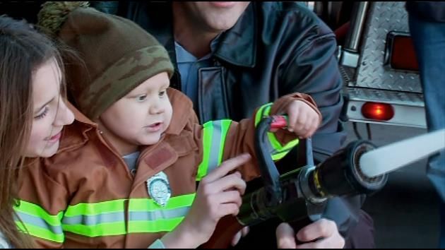 Cancer stricken 2-year-old becomes firefighter for a day